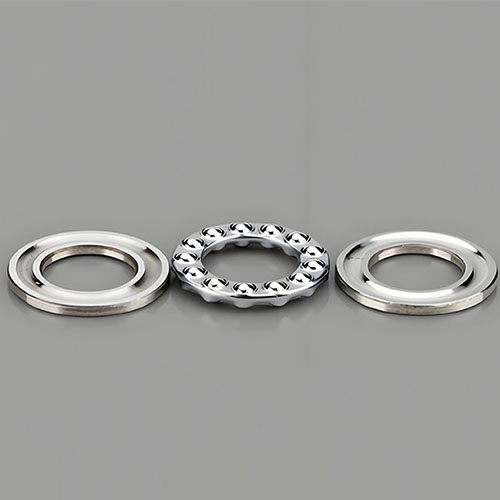 A thrust ball bearing is a rolling-element bearing designed to accommodate pure axial loads in one or two directions.