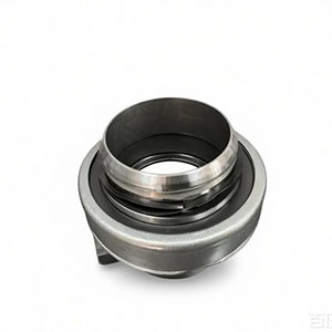 A ball‑type mechanical release bearing uses hardened steel spheres as its rolling elements..jpeg