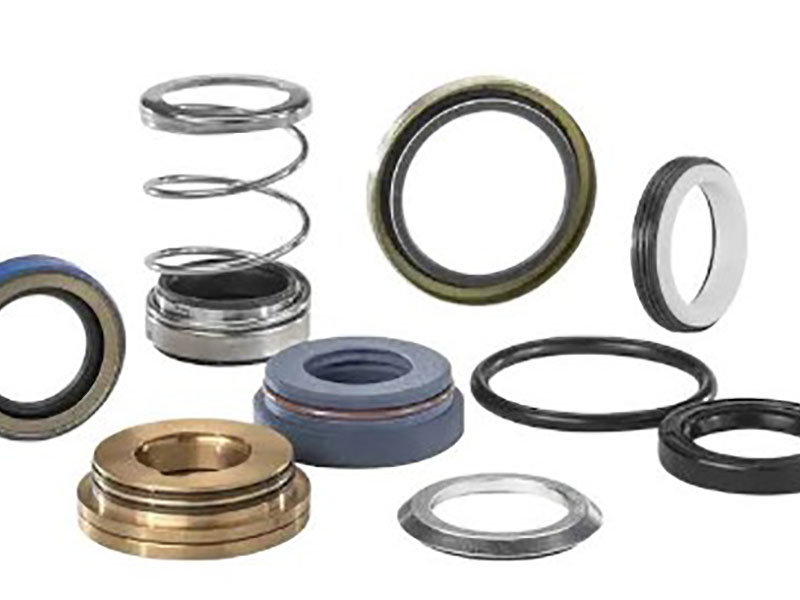 Cross section of bearing seal showing four core functions: retaining lubricant inside bearing chamber, blocking dust and moisture contaminants, balancing pressure differentials, and managing friction-efficiency trade-off