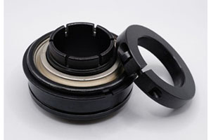 UE205 — Eccentric locking collar insert bearing with flat head for 25mm shaft.