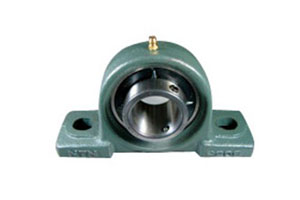 UKPH207 High‑center pillow block bearing unit with tapered bore insert and adapter sleeve.