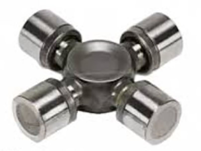 Polished contact marks on yoke ears from U-joint binding at extreme suspension angles, indicating over-flexing and metal-to-metal wear